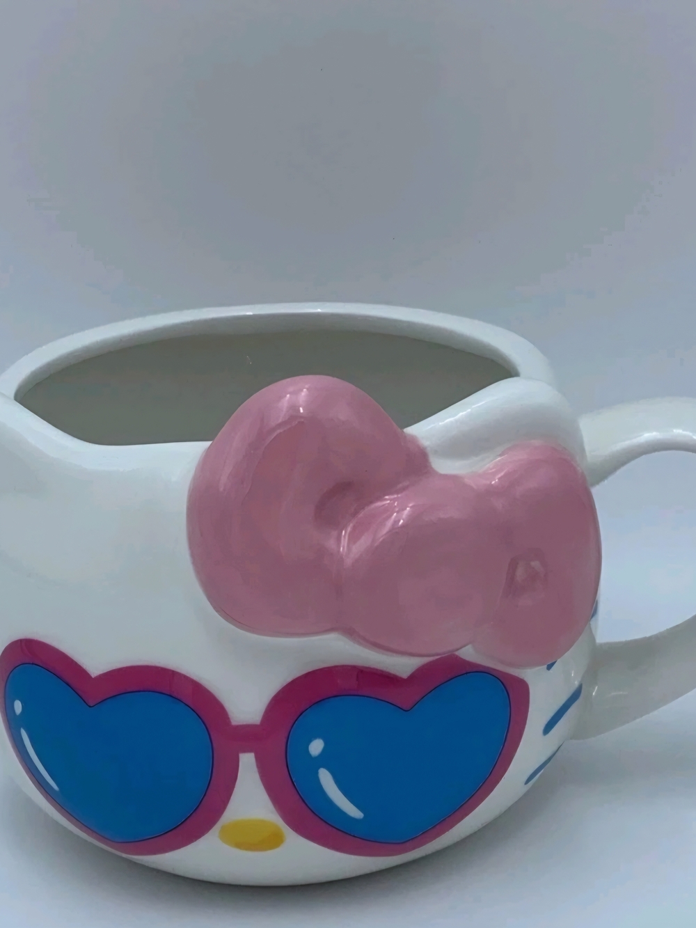 Hello Kitty White Ceramic Mug with Pink Bow and Blue Sunglasses